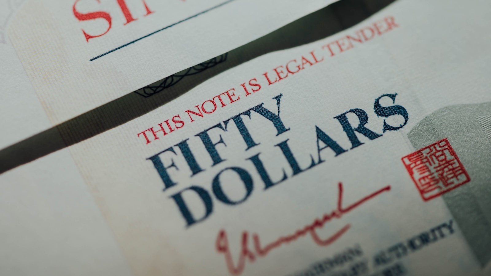 white printer paper with red and black text